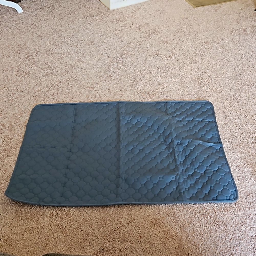 NWOT  Waterproof animal washable and reusable bed mat.